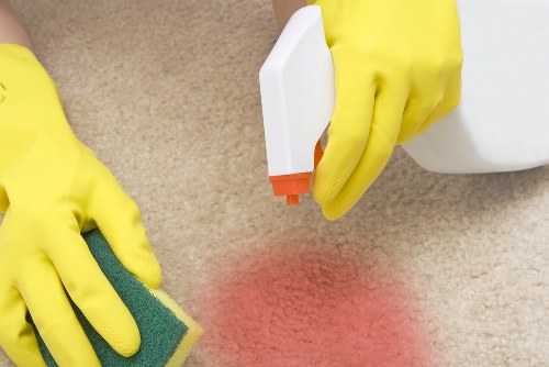 Deep cleaning a kitchen with attention to hidden grease and grime