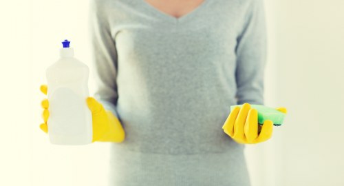 End of tenancy cleaning in progress in a rental kitchen