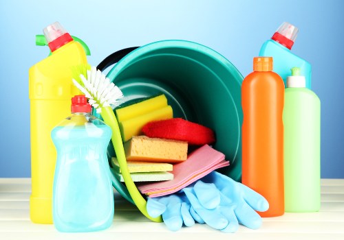 Office cleaning supplies and sanitized workspace surfaces